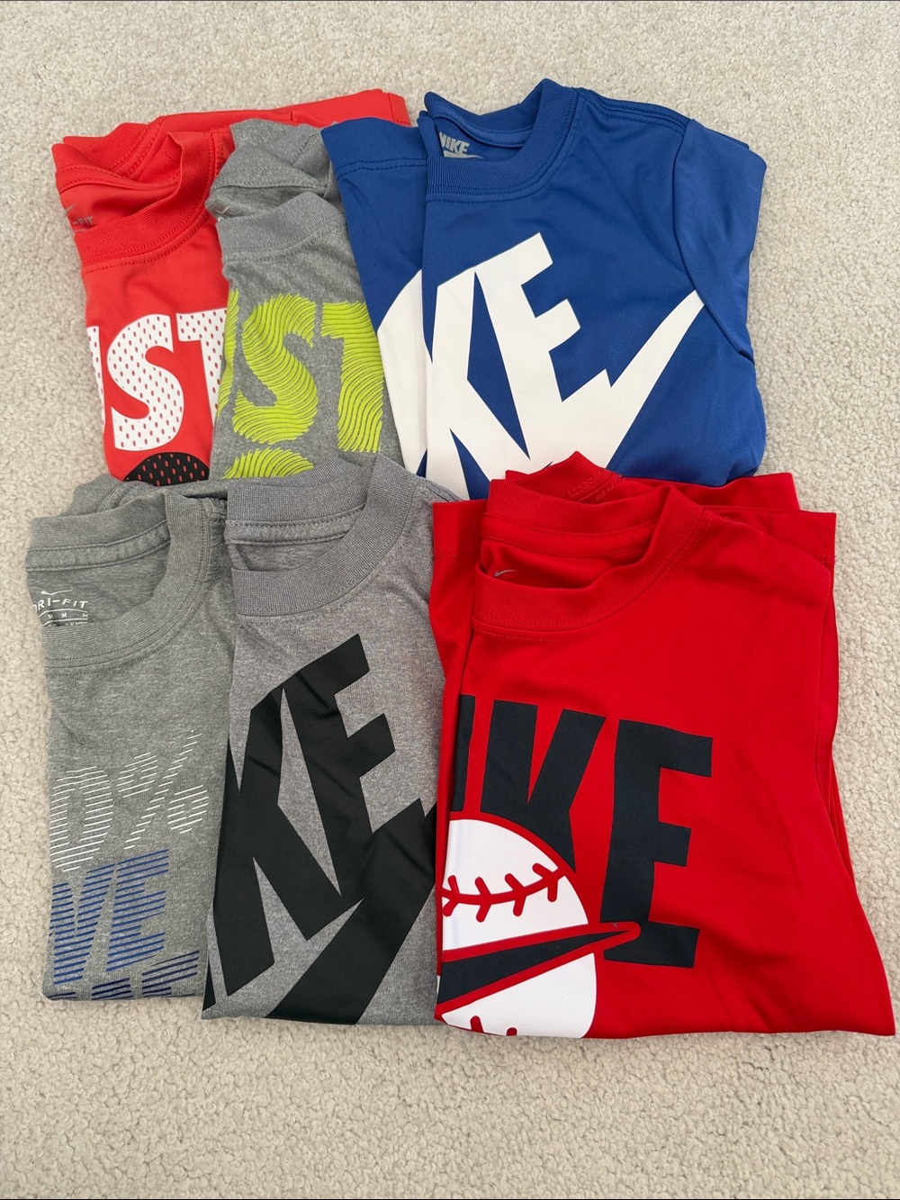 Nike Kids Short Sleeve Tees - Red, Blue, Gray, 2 shirts size 6, and 4 size 7
